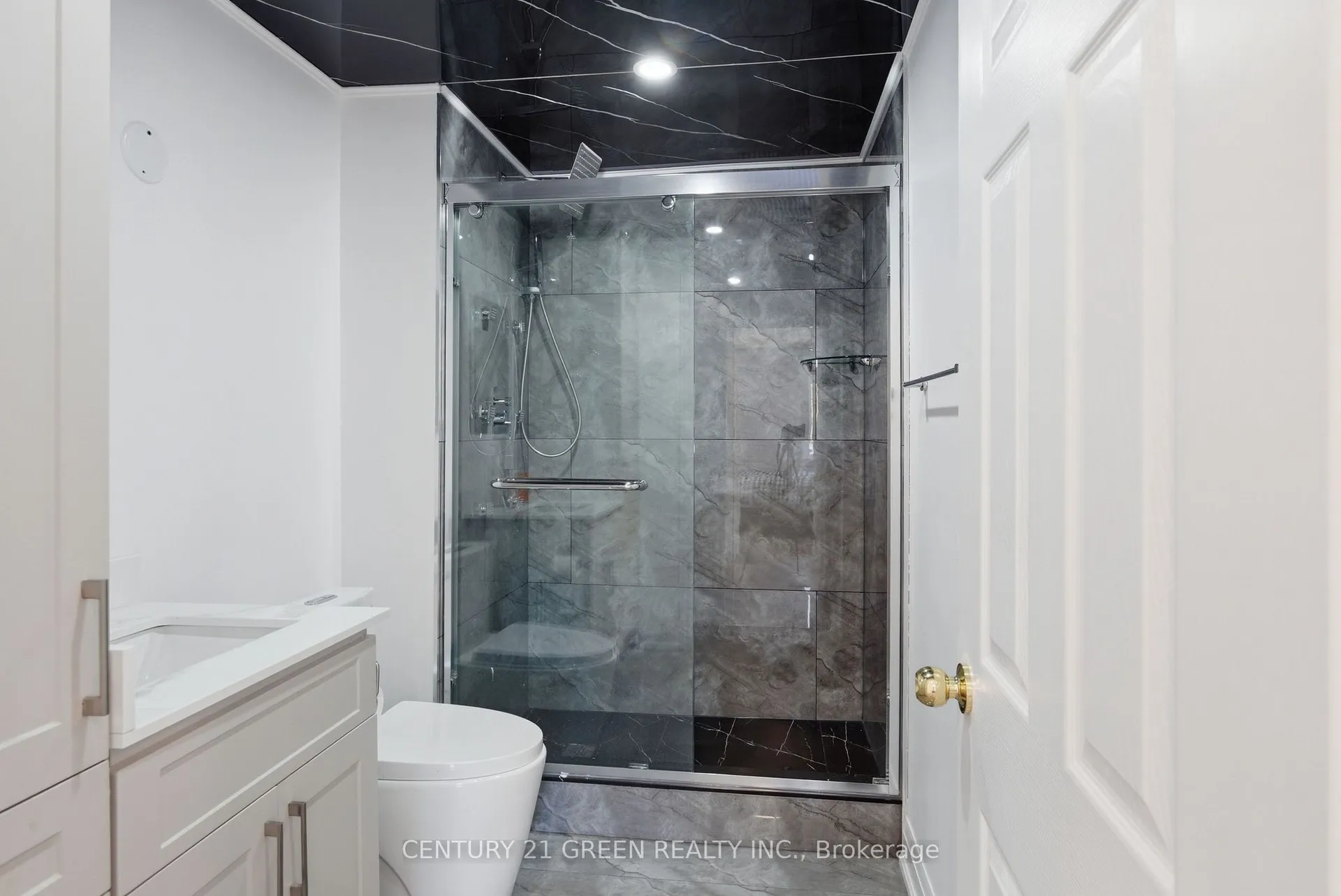 135 Village Street, Hastings Highlands — four-piece bathroom with glass-enclosed walk-in shower and tiled walls