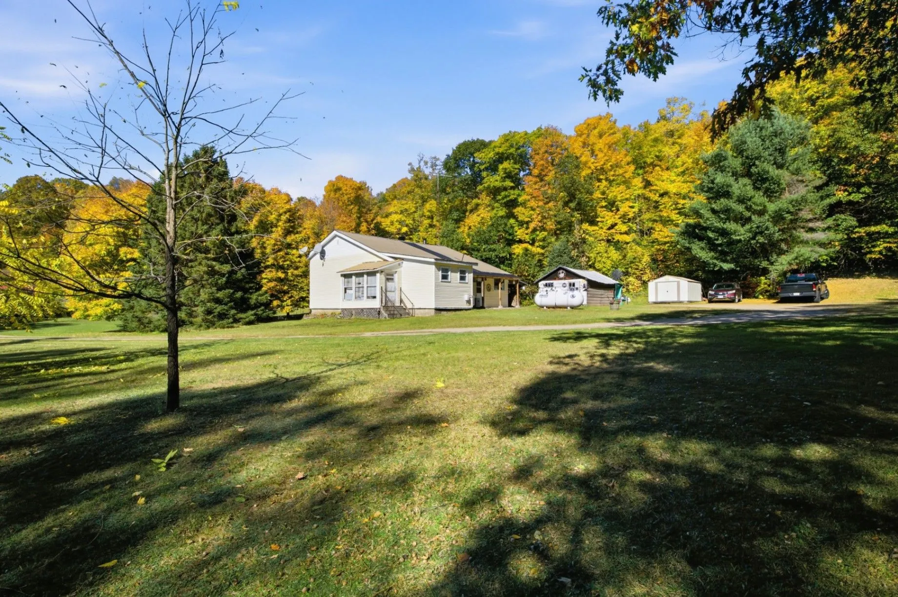3192 Matawatchan Rd, Greater Madawaska — bungalow with covered porch, garage/workshop, storage shed and woodshed